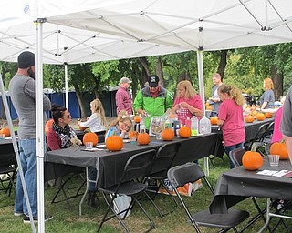 Neighbors | Alexis Bartolomucci.People picked out pumpkins at Boardman Park during Oktoberfest on Oct. 2 to paint and take home.