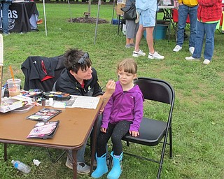 Neighbors | Alexis Bartolomucci.Madeline got her face painted during Oktoberfest at Boardman Park on Oct. 2.