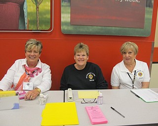 Neighbors | Alexis Bartolomucci.Boardman Lions Club members checked in Boardman residents who attended the Coats for Kids project event at Target on Oct. 4. Pictured are, from left, Kris Dailey, Betsy Koch and Jane Cornelius.