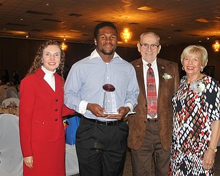 Neighbors | Submitted.Maraline Kubik, Director, Sister Jerome's Mission, Ramone Elkins, first scholarship recipient, Clarence R. Smith Jr. and Rose Marie Smith posed for a picture while enjoyong the dinner celebration.
