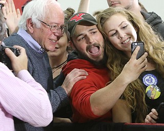 ROBERT K. YOSAY | THE VINDICATOR..Bernie Sanders gets a selfie with Marino November and Mickal Mymo both seniors .. - -30-...