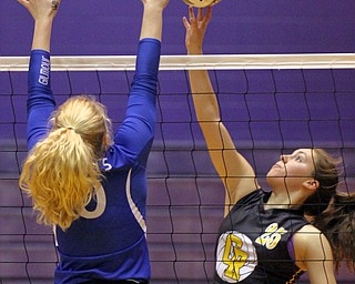 William D. Lewis/The Vindicator Crestview's Brenna Auer(26) returns a shot past Gilmour's Megan Brzozowski(0) during Nov 3, 2016 action in Barberton.