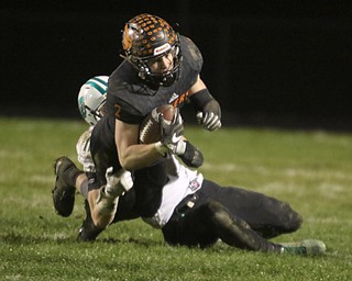  .          ROBERT  K. YOSAY | THE VINDICATOR..Springfield Tigers vs Columbia Raiders..#2 Frankie Centofanti is hauled down  by Columbia #11 Jared Heidecker after a short gain during second quarter action.-30-