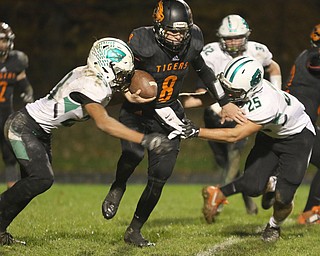  .          ROBERT  K. YOSAY | THE VINDICATOR..Springfield Tigers vs Columbia Raiders..Columbia #23  Brandon Coleman and number #25 Mike Jacobucci  try to close  in on Springfield #8 Brannon Brungard .during first quarter action..-30-