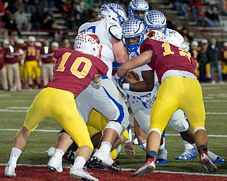 MICHAEL G TAYLOR | THE VINDICATOR- 11-04-16- 2nd qtr, Hubbard's #5 Rafael Morales bulls his way to a TD. OHSAA D4 Football Playoffs Hubbard Eagles vs Cardinal Mooney Cardinals at Stambaugh Stadium, YSU in Youngstown, OH