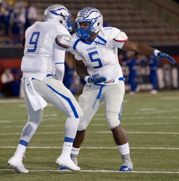 MICHAEL G TAYLOR | THE VINDICATOR- 11-04-16- 2nd qtr, Hubbard's #5 Rafael Morales and teammate #9  celebrate his td. OHSAA D4 Football Playoffs Hubbard Eagles vs Cardinal Mooney Cardinals at Stambaugh Stadium, YSU in Youngstown, OH