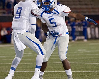 MICHAEL G TAYLOR | THE VINDICATOR- 11-04-16- 2nd qtr, Hubbard's #5 Rafael Morales and teammate #9  celebrate his td. OHSAA D4 Football Playoffs Hubbard Eagles vs Cardinal Mooney Cardinals at Stambaugh Stadium, YSU in Youngstown, OH