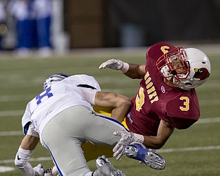 MICHAEL G TAYLOR | THE VINDICATOR- 11-0416- 2nd qtr, Hubbard's #8 hits Mooney's #3 just as he makes the catch causing the ball pop loose. OHSAA D4 Football Playoffs Hubbard Eagles vs Cardinal Mooney Cardinals at Stambaugh Stadium, YSU in Youngstown, OH