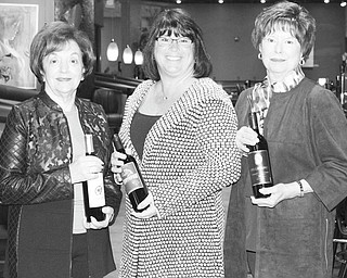 DUSTIN LIVESAY | THE VINDICATOR
The 30th annual Magic of the Angels Christmas will take place Nov. 19 at Mr. Anthony’s Banquet Centre in Boardman. Preparing for the event, from left, are chairmen Joan Zarlenga and Shelly LaBerto and Geri Kosar, president of Angels of Easter Seals.