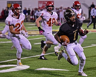 WARREN, OHIO - NOVEMBER 4, 2016: Lynn Bowden #1 of Harding sprints past Jordan Shaheen #22, Jack O'Donnell #48 and Tanner Watson #62 of Brecksville-Broadview Heights on his way into the end zone to score 75 yard kickoff return for a touchdown during the first half of their game Friday night at Warren Harding High School. DAVID DERMER | THE VINDICATOR