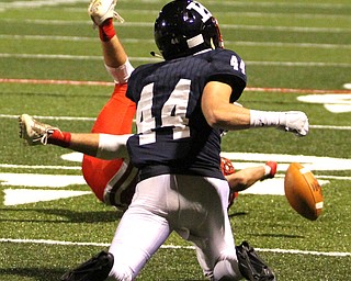 Nikos Frazier | The Vindicator..JFK's Jacob Coates(44) misses a pass in the first quarter during an OSHAA Division VII Playoff game between Toronto and John F. Kennedy Catholic High School in Warren at Mollenkopf Stadium in Warren on Saturday, Nov. 5, 2016.