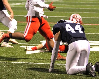 Nikos Frazier | The Vindicator..JFK's Jacob Coates(44) reacts on the turf after missing a pass in the first quarter during an OSHAA Division VII Playoff game between Toronto and John F. Kennedy Catholic High School in Warren at Mollenkopf Stadium in Warren on Saturday, Nov. 5, 2016.