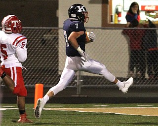 Nikos Frazier | The Vindicator..JFK's Evan Boyd prances into the end zone for a touchdown in the second quarter during an OSHAA Division VII Playoff game between Toronto and John F. Kennedy Catholic High School in Warren at Mollenkopf Stadium in Warren on Saturday, Nov. 5, 2016.