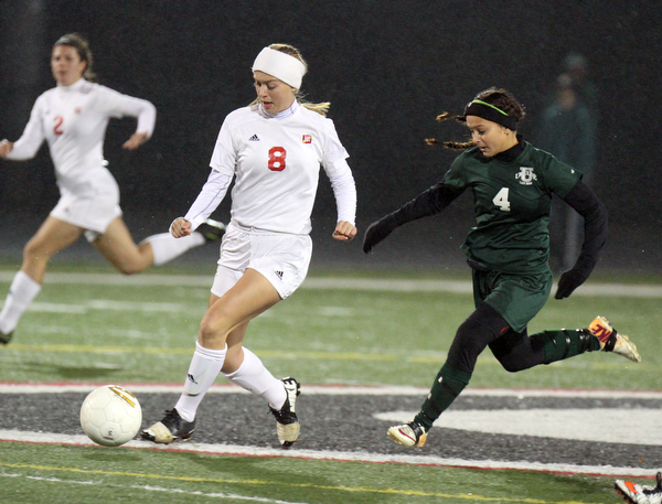 William D. Lewis the Vindicator  Mooney's Colleen Durkin(8) and Ursuline's Adi Quattro(4) go for the ball during 10272016 action at Girard.