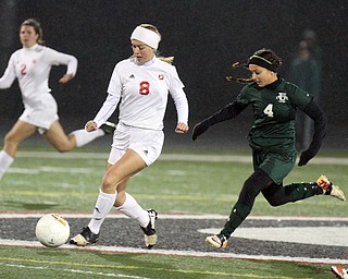 William D. Lewis the Vindicator  Mooney's Colleen Durkin(8) and Ursuline's Adi Quattro(4) go for the ball during 10272016 action at Girard.