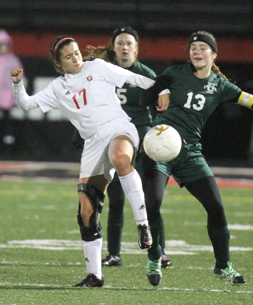 William D. Lewis the Vindicator  Mooney's Elizabeth Philibin(17 and /ursulines Abby Price (5) and ) and Ursuline's Breanna Bowell(13) go for the ball during 10272016 action at Girard.