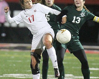 William D. Lewis the Vindicator  Mooney's Elizabeth Philibin(17 and /ursulines Abby Price (5) and ) and Ursuline's Breanna Bowell(13) go for the ball during 10272016 action at Girard.
