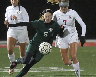 William D. Lewis the Vindicator  Ursuline's Abby Price(5) and Mooney's Alexa Saunders(7) go for the ball during 10272016 action at Girard.