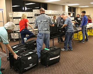        ROBERT K. YOSAY  | THE VINDICATOR..Board of Election workers unload ballots and results at the Board of Elections  at Oak Hill Renisance Center..Election 2016...  . - -30-...