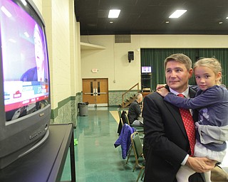 William D. Lewis The Vindicator John Boccieri and his daughter Emma, 6,during an election night party at St Luke Hall in Boardman.