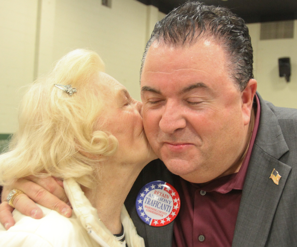 William D. Lewis The Vindicator Anthony Traficanti, Mahoning County Commissioner gets a kiss from his mother Barbara Ann Traficanti during an election night party at St Luke Hall in Boardman.