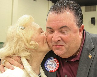 William D. Lewis The Vindicator Anthony Traficanti, Mahoning County Commissioner gets a kiss from his mother Barbara Ann Traficanti during an election night party at St Luke Hall in Boardman.