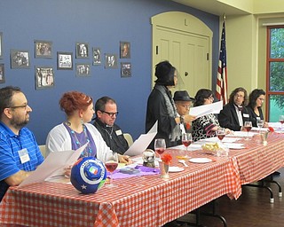 Neighbors | Alexis Bartolomucci.Volunteers dressed up as suspects and gave clues for the Murder in the Library event on Sept. 29 at the Boardman library.
