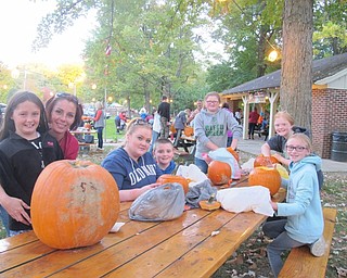 Neighbors | Alexis Bartolomucci.Friends and families attended Boardman Park during Oct. 14-16 to carve pumpkins to enter in the Great Pumpkin Carve Out contest.