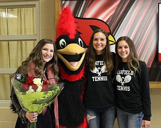 Neighbors | Abby Slanker.State-bound Canfield High School sophomore golfer Hannah Keffler, the Canfield Cardinal, state-bound senior tennis player Hannah Ciancola and state-bound sophomore tennis player Sydney Cianciola, left to right, were honored with the CHS tradition of a walk-though before traveling to their respective state competitions Oct. 19.