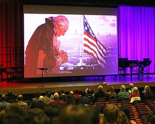        ROBERT K. YOSAY  | THE VINDICATOR..as part of the program "the True Story" of  " Our National Anthem"  was told.....33rd Veterans Day Program as Junior and Seniors gathered in the Auditorium to honor those that served our country .. - -30-...