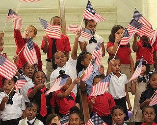        ROBERT K. YOSAY  | THE VINDICATOR..patriotic songs by students of St Joe the Provider School.Veterans Day observance ceremony in the rotunda-.. - -30-...
