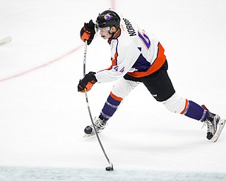 Scott R. Galvin | Vindicator .Youngstown Phantoms forward Coale Norris (44) takes a wrist shot on net against the Bloomington Thunder during the second period at the Covelli Centre on November 12, 2016.
