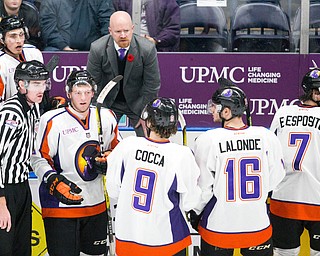 Scott R. Galvin | Vindicator .Youngstown Phantoms head coach Brad Patterson talks with his players during an officials timeout during the second period against the Bloomington Thunder at the Covelli Centre on November 12, 2016.