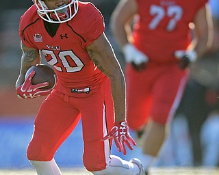 YOUNGSTOWN, OHIO - NOVEMBER 12, 2016: Running back Jody Webb #20 of YSU runs the ball in the open field during the second half of their game Saturday afternoon at Stambaugh Stadium. YSU won 21-14. DAVID DERMER | THE VINDICATOR