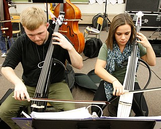        ROBERT K. YOSAY  | THE VINDICATOR..Electric Base as Simon Pusateri and Delia Walkowiec..Trans-Siberian Orchestra will be visiting Boardman High School to see the schoolÕs orchestra members Wednesday . . - -30-