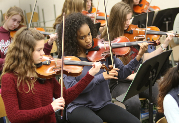        ROBERT K. YOSAY  | THE VINDICATOR..Anna Oliver- Freshman - CeAnna Curtis -Sophmore and Alyssa Wilhelm -Sophmore  violins..Trans-Siberian Orchestra will be visiting Boardman High School to see the schoolÕs orchestra members Wednesday . . - -30-