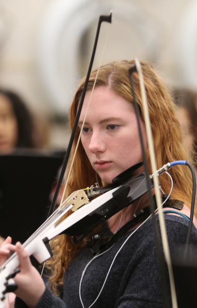        ROBERT K. YOSAY  | THE VINDICATOR..intense while playing ...Annabelle Adkins playing electric  violin..Trans-Siberian Orchestra will be visiting Boardman High School to see the schoolÕs orchestra members Wednesday . . - -30-
