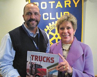 SPECIAL TO THE VINDICATOR
Ellen Tressel, wife of Youngstown State University President Jim Tressel, recently visited the Rotary Club of Austintown to thank the group for their community service. Ed Kalaher, president of Austintown Rotary, presented Tressel with a book to be placed in her honor in the Austintown Elementary School library.
