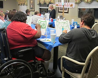 Neighbors | Alexis Bartolomucci.Guests at Beeghly Oaks worked on painting their owl pictures during the Paint and Taste event on Oct. 14.