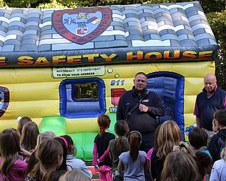 Neighbors | Abby Slanker.Cardinal Joint Fire District firefighter/paramedic Ted Smith showed Hilltop Elementary School second-grade students the department’s Fire Safety House as a part of Fire Safety Week on Oct. 12.
