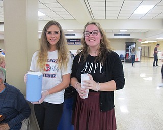 Neighbors | Alexis Bartolomucci.Taylor Phillips and Caitlin Correia served lemonade to the guests during the Senior Citizens Dinner at Austintown Fitch High School on Oct. 26.