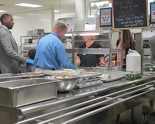 Neighbors | Alexis Bartolomucci.Students and faculty members from Austintown City School District helped serve the senior citizens during the Senior Citizens Dinner at Fitch High School on Oct. 26.