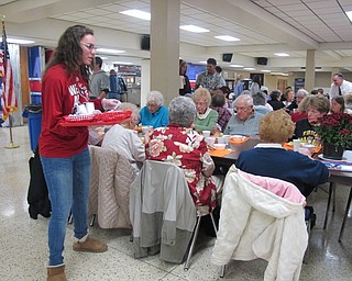Neighbors | Alexis Bartolomucci.Austintown Fitch High School students served food, drinks and other items to the guests who attended the Senior Citizens Dinner at the high school on Oct. 26.