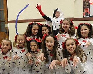 Neighbors | Abby Slanker.A group of sixth-grade Canfield Village Middle School students dressed as "101 Dalmatians," complete with Cruella Deville, during the school’s annual Halloween dress up day on Oct. 28.