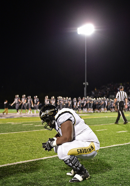 TWINSBURG, OHIO - NOVEMBER 18, 2016: Caprice Sledge #91 of Harding reacts on the field after the clock hit triple zero of their playoff game Friday night at Twinsburg High School. Hudson won 24-21. DAVID DERMER | THE VINDICATOR