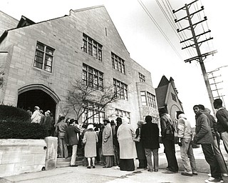 Annual 'feast' attracts many who are in need..The line formed early -- some showed up as early as 90 minutes before hand -- as First Presbyterian Church of Youngstown held its annual "Thanksgiving Celebration" feast for needy residents of the area. In all, 627 people came to enjoy a free ham dinner Tuesday afternoon at the church, Wick Avenue at Wood Street. Musical entertainment was added to the festivities this year, and buses provided free transportation to the church from a variety of location around the city,. Funding for the meal is provided entirely by donations from church members, who also prepare and serve the food. Last year, more than 700 partook of the free dinner...The Vindicator/ Choo H. Ng