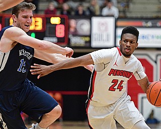 YOUNGSTOWN, OHIO - NOVEMBER 22, 2016: Cameron Morse #24 of YSU drives on Jarret Vrabel #15 of Westminster during the first half of their game Tuesday night at the Beeghly Center. DAVID DERMER | THE VINDICATOR