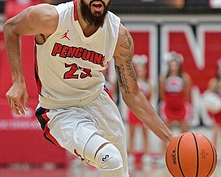 YOUNGSTOWN, OHIO - NOVEMBER 22, 2016: Francisco Santiago #23 of YSU drives to the basket during the first half of their game Tuesday night at the Beeghly Center. DAVID DERMER | THE VINDICATOR