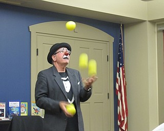 Neighbors | Alexis Bartolomucci.Jocko the Clown showed the audience how to juggle during his Clowning Around show at Boardman library on Oct. 18.