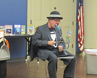 Neighbors | Alexis Bartolomucci.Jocko the Clown made his own wooden puppet and showed the audience how it could dance during his performance on Oct. 18 at the Boardman library.
